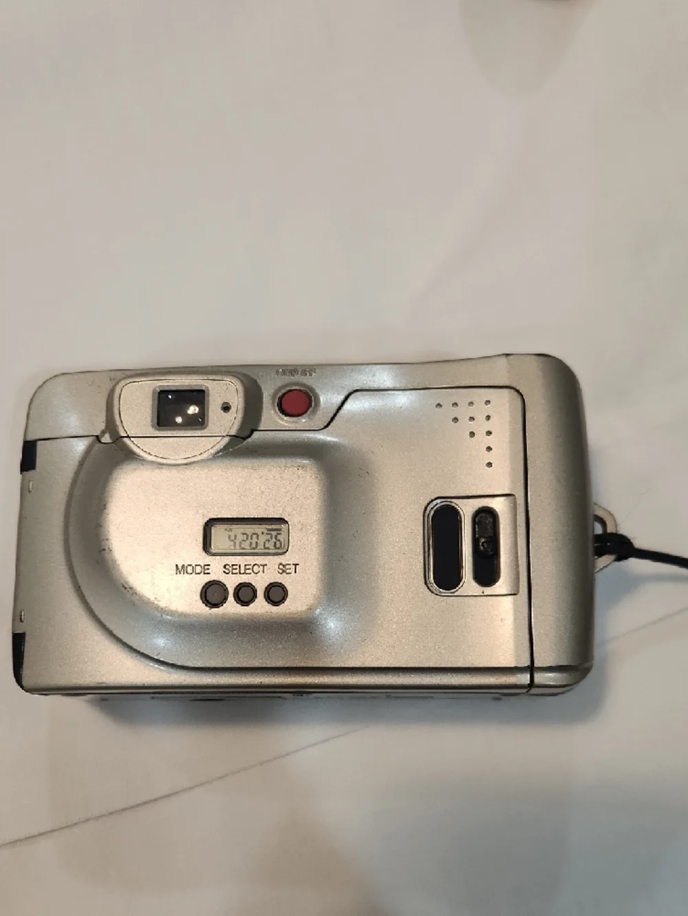 Samsung Silver Point-and-Shoot Film Camera with Black Film Canister